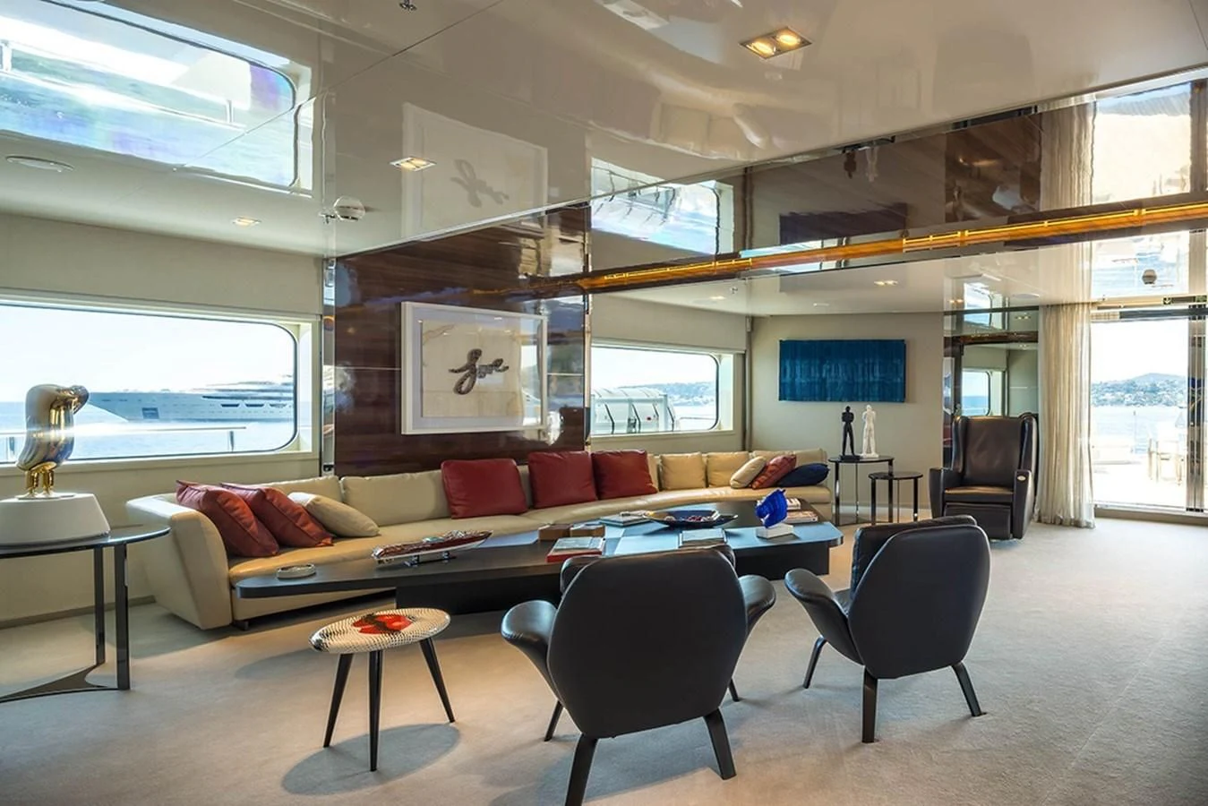 a living room with a couch and a table aboard MARQUISE Yacht for Sale