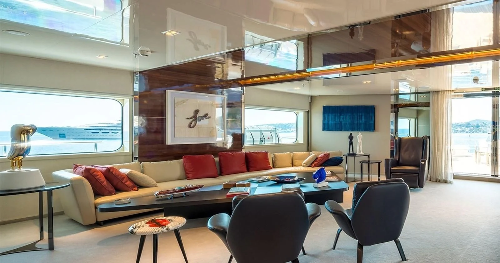 a living room with a couch and a table aboard MARQUISE Yacht for Sale