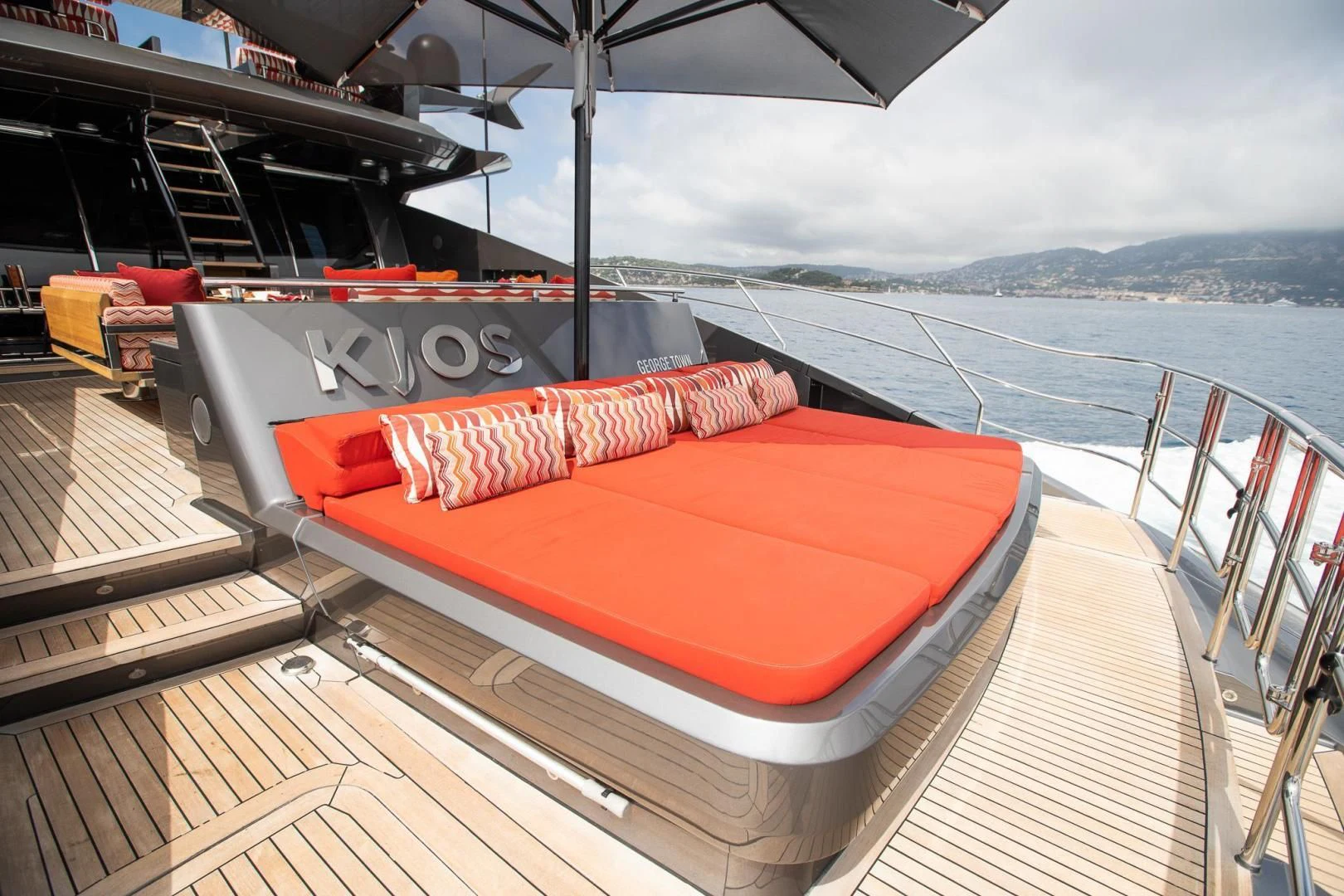 a boat on a deck aboard KJOS Yacht for Charter
