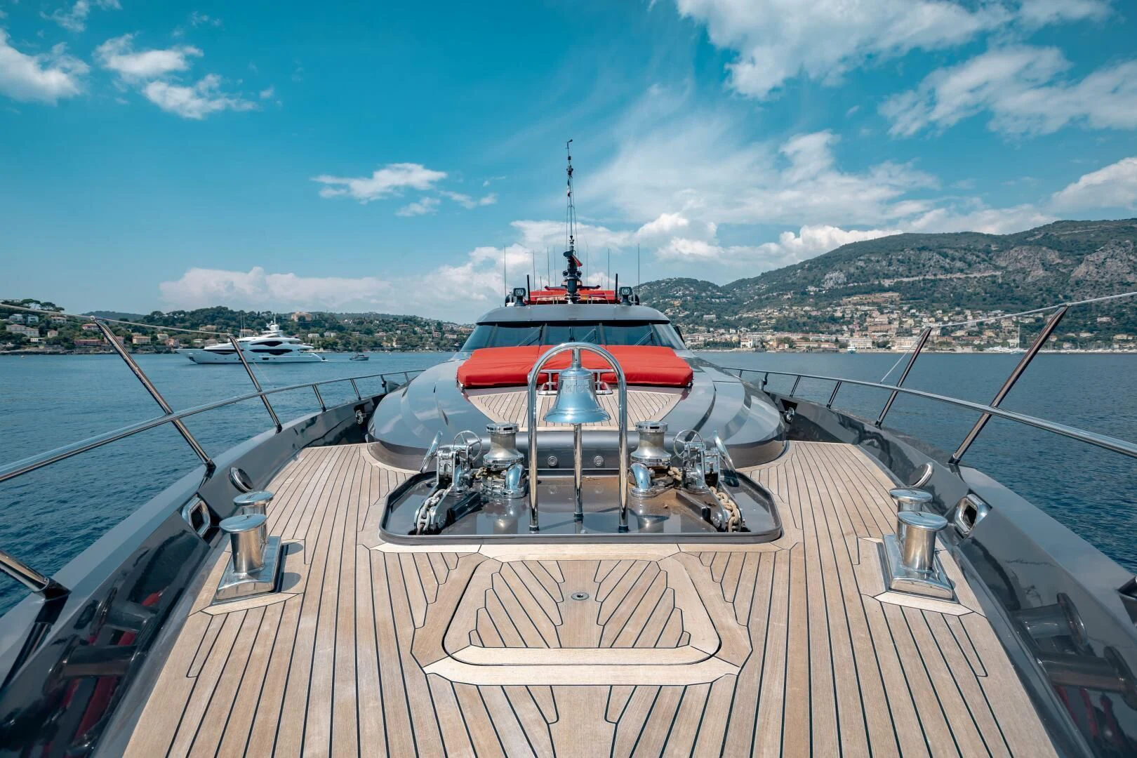 a boat on a deck aboard KJOS Yacht for Charter