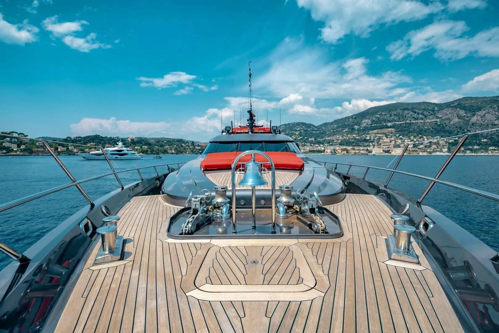 a boat on a deck aboard KJOS Yacht for Charter
