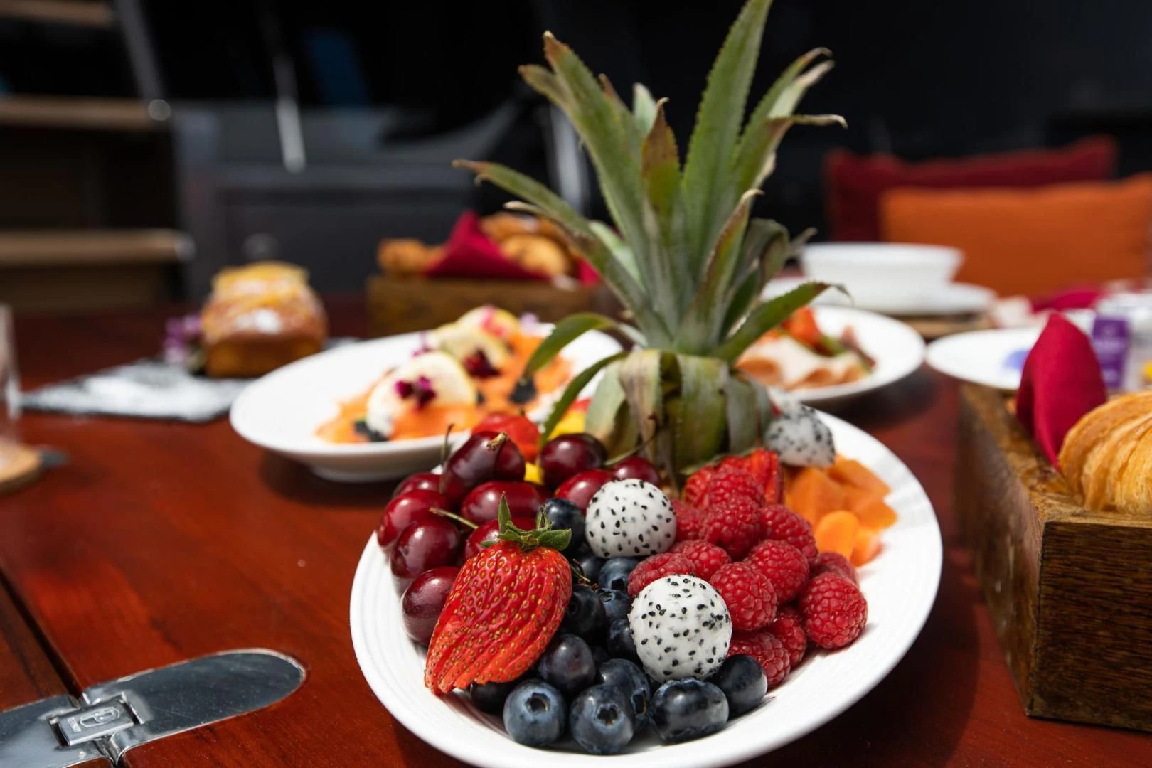 a plate of fruit aboard KJOS Yacht for Charter