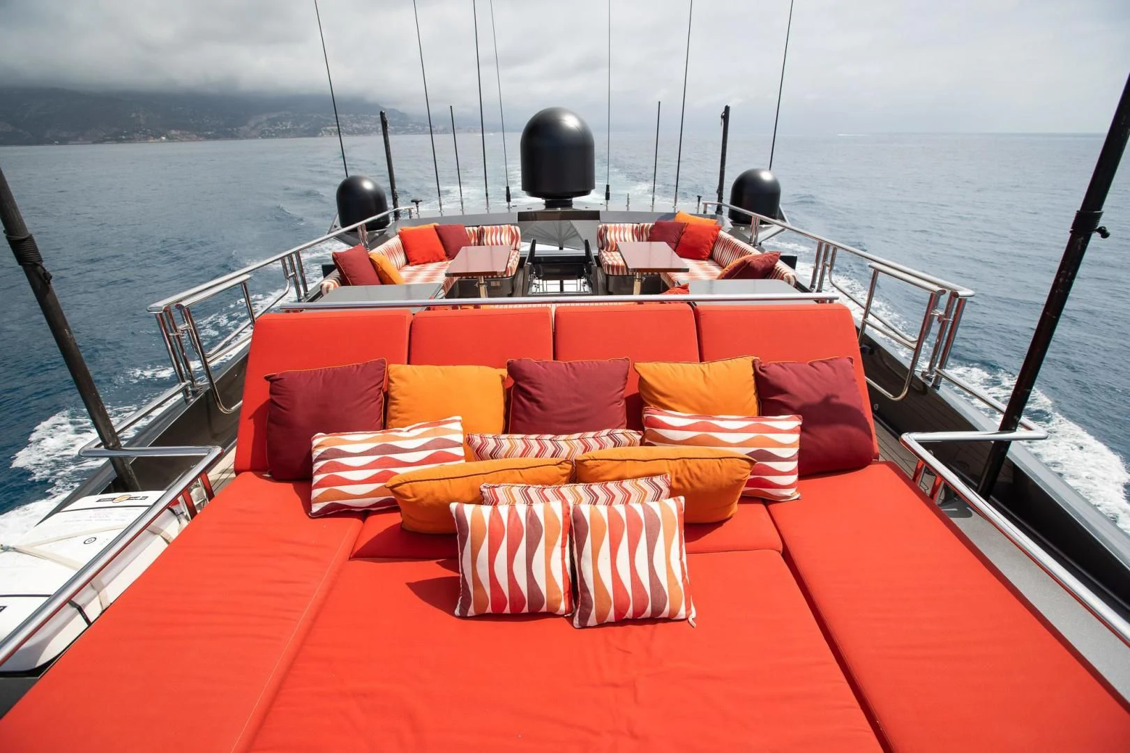 a boat with pillows on a boat aboard KJOS Yacht for Charter