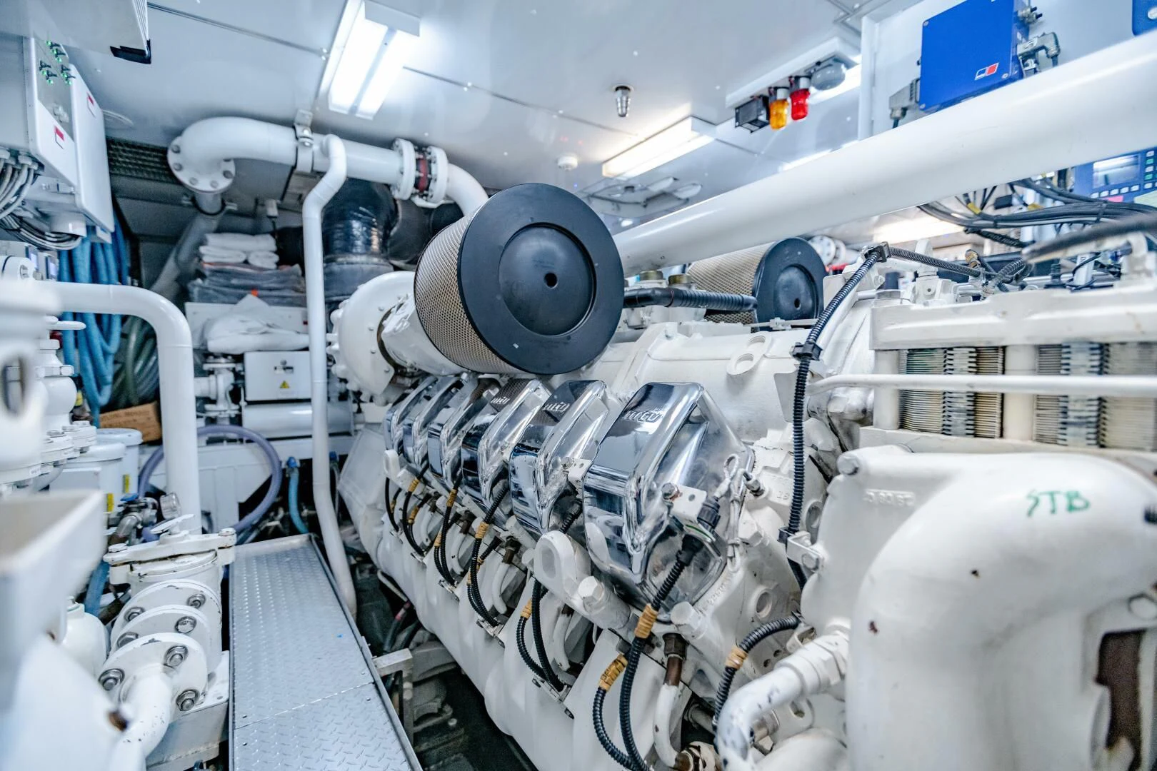a room with several white machines aboard KJOS Yacht for Charter