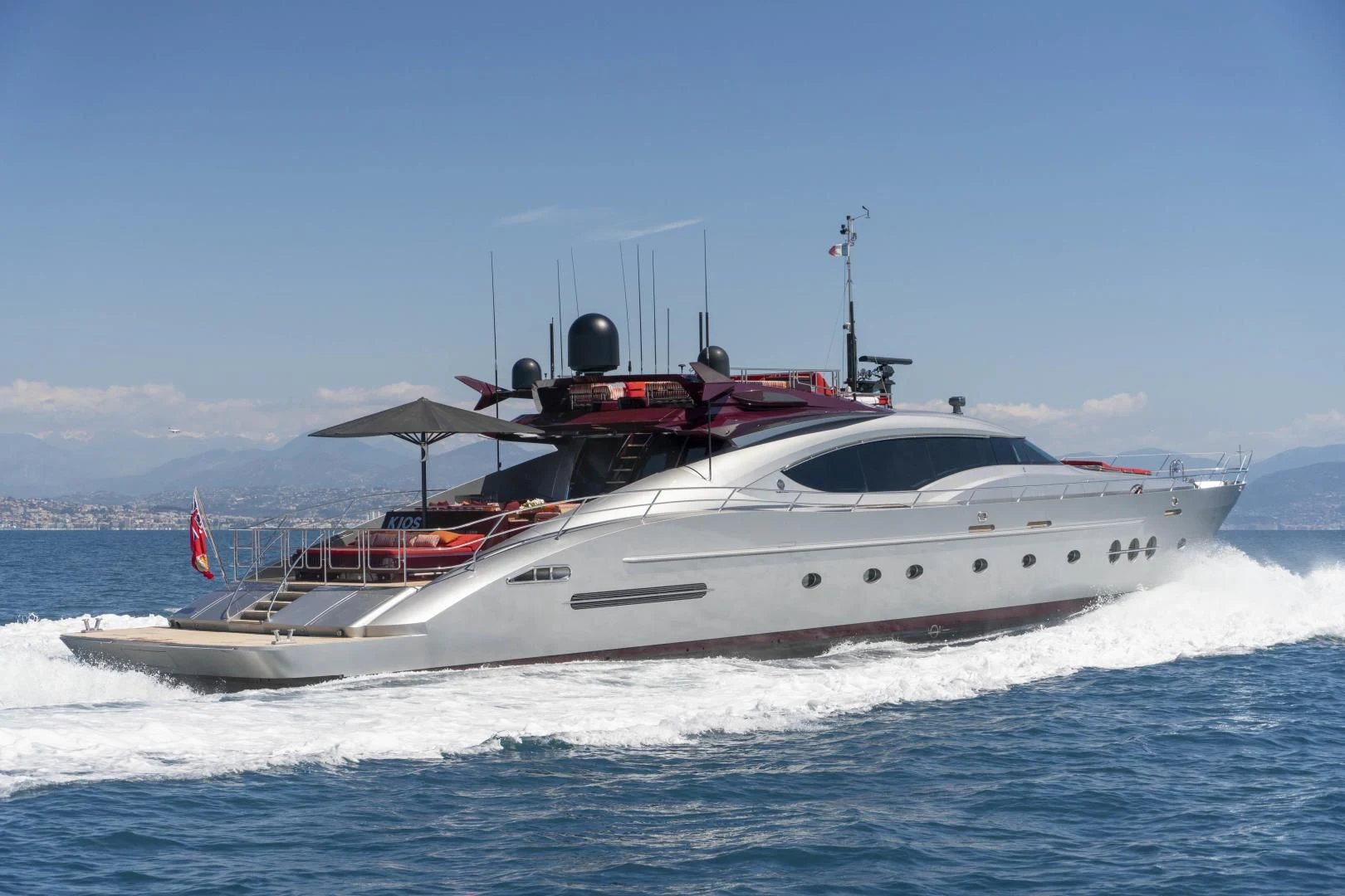 a white yacht in the water aboard KJOS Yacht for Charter