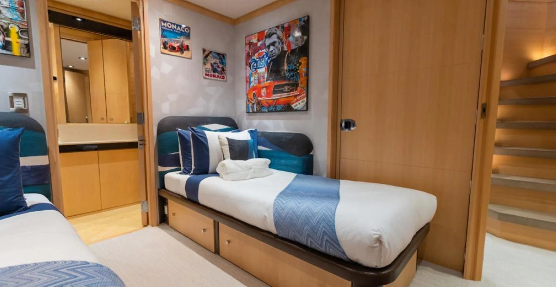 a bed in a room aboard KJOS Yacht for Charter