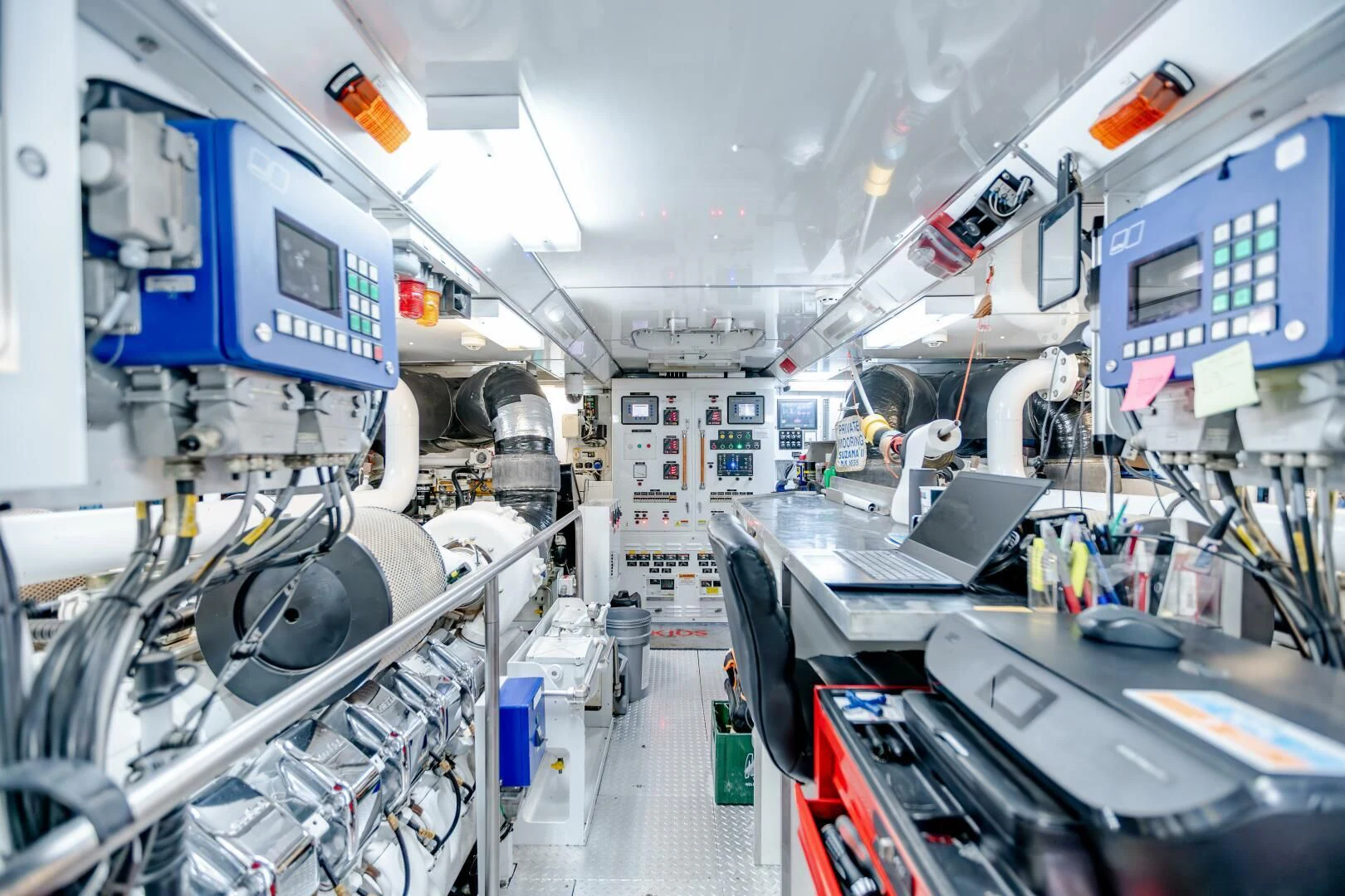 a room with machines and equipment aboard KJOS Yacht for Charter