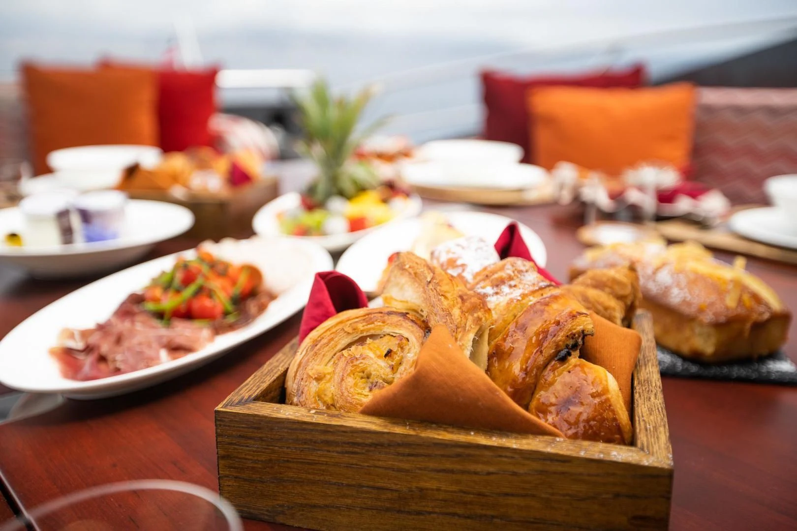 a table full of food aboard KJOS Yacht for Charter
