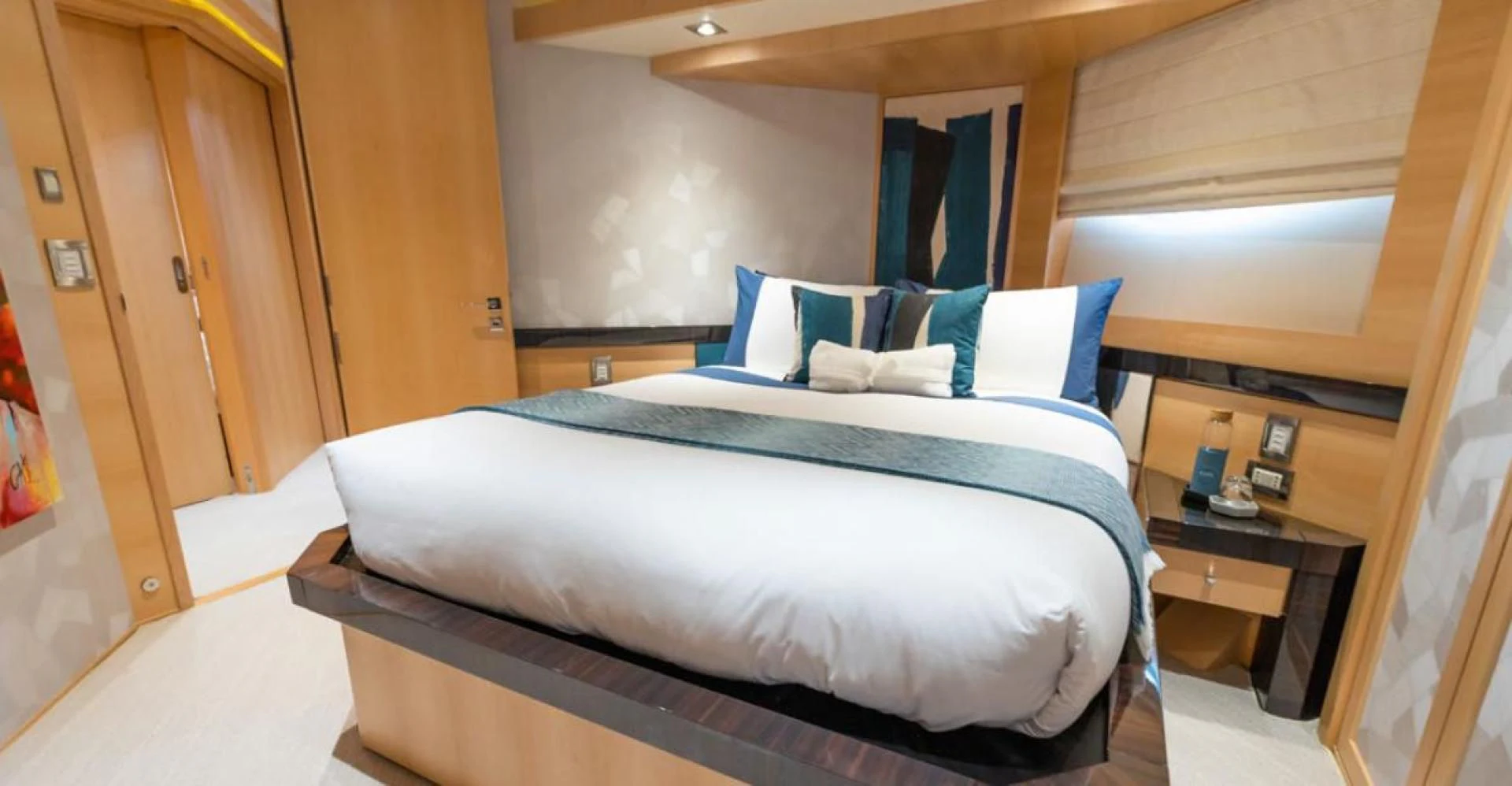 a bed in a room aboard KJOS Yacht for Charter