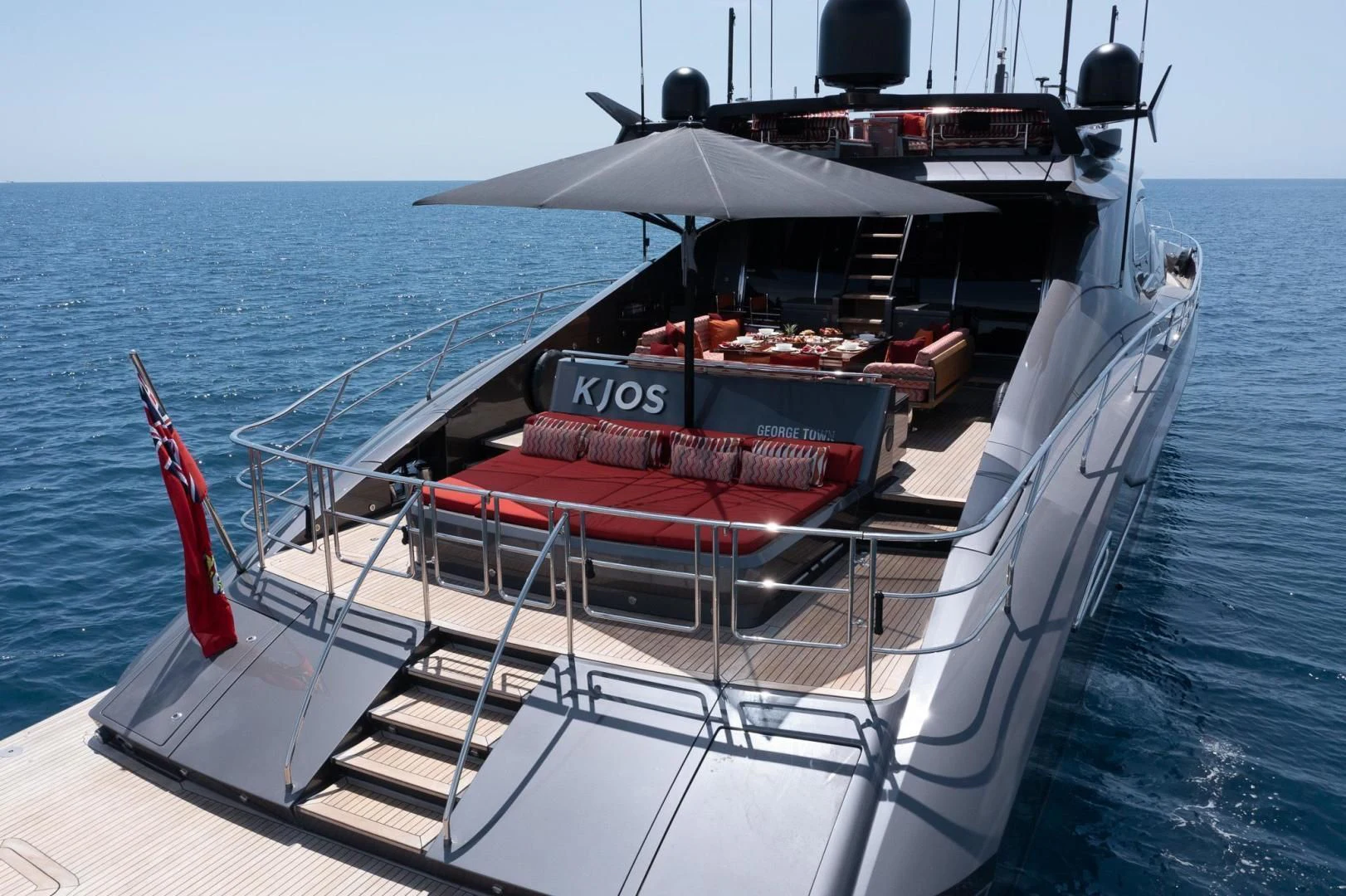 a boat with a tray of food on it aboard KJOS Yacht for Charter