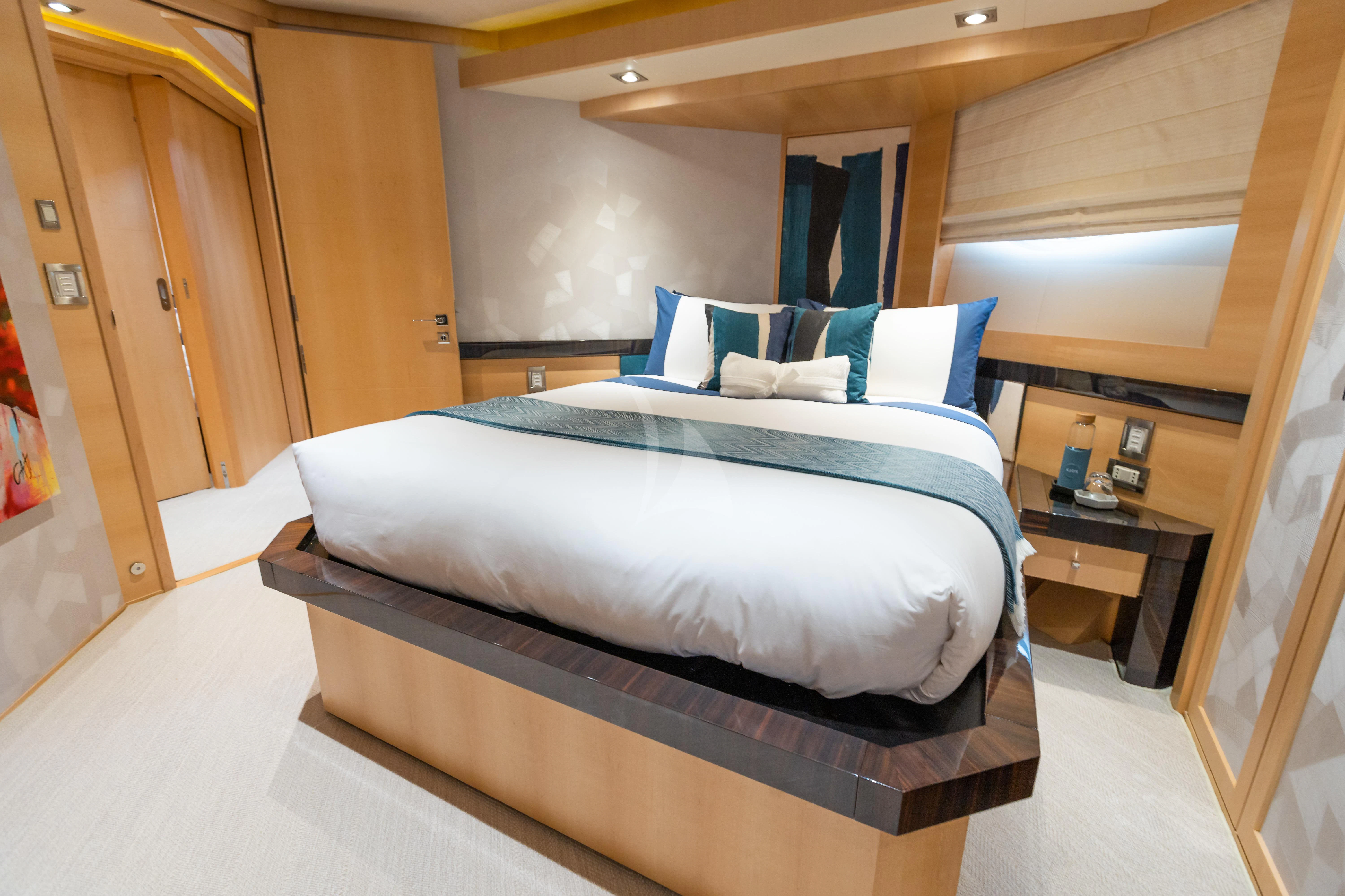 a bed in a room aboard KJOS Yacht for Charter