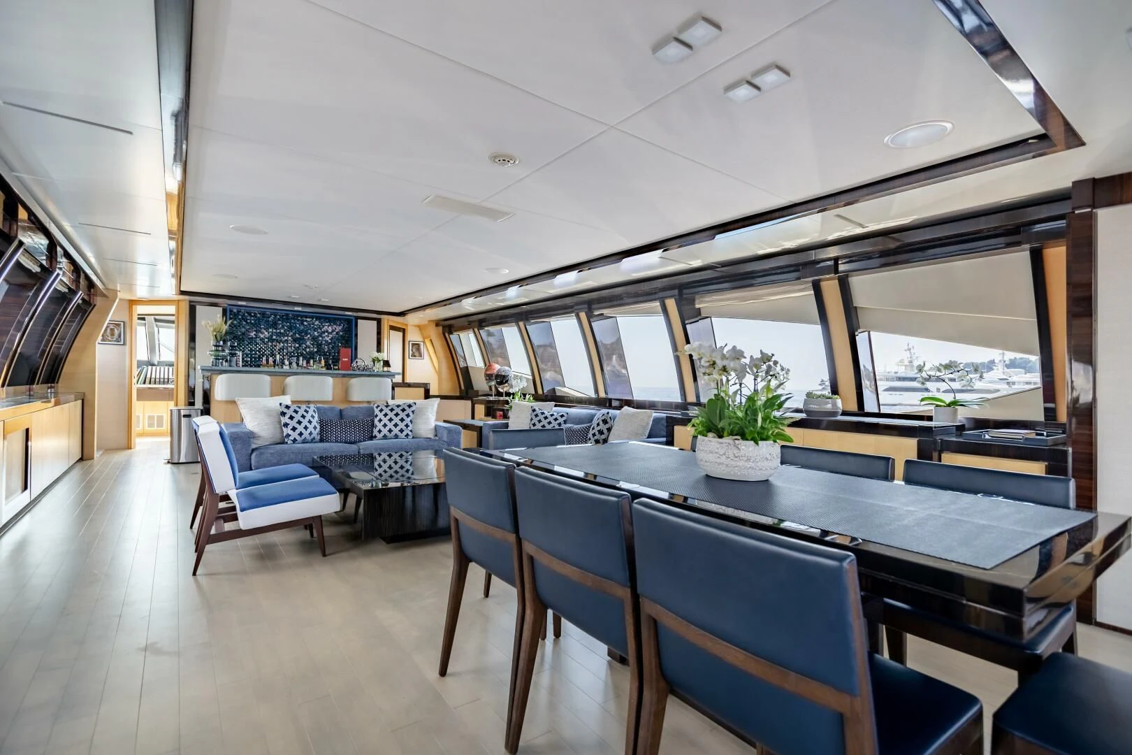 a large open kitchen and dining area aboard KJOS Yacht for Charter
