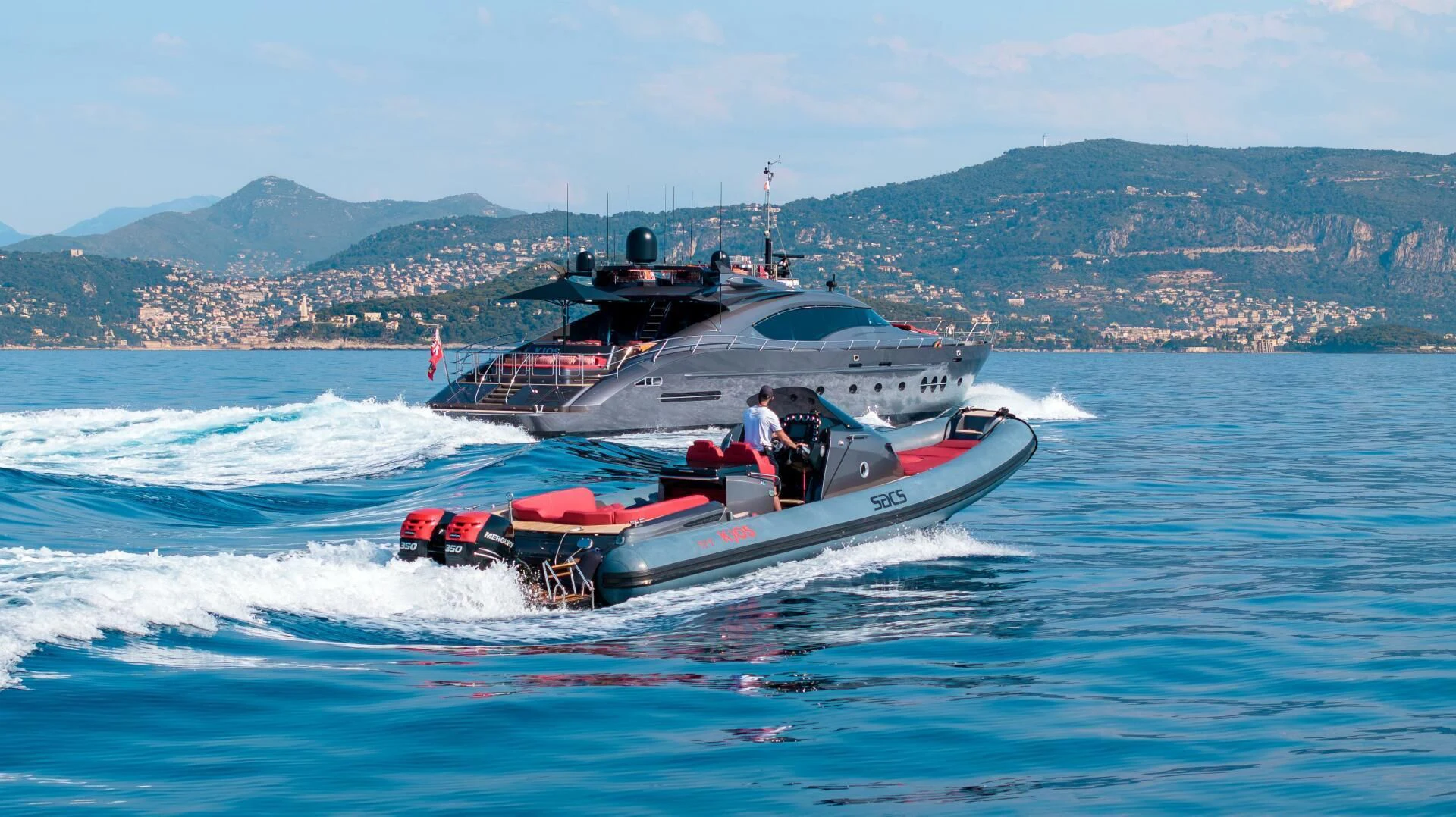 a boat with a person on it aboard KJOS Yacht for Charter