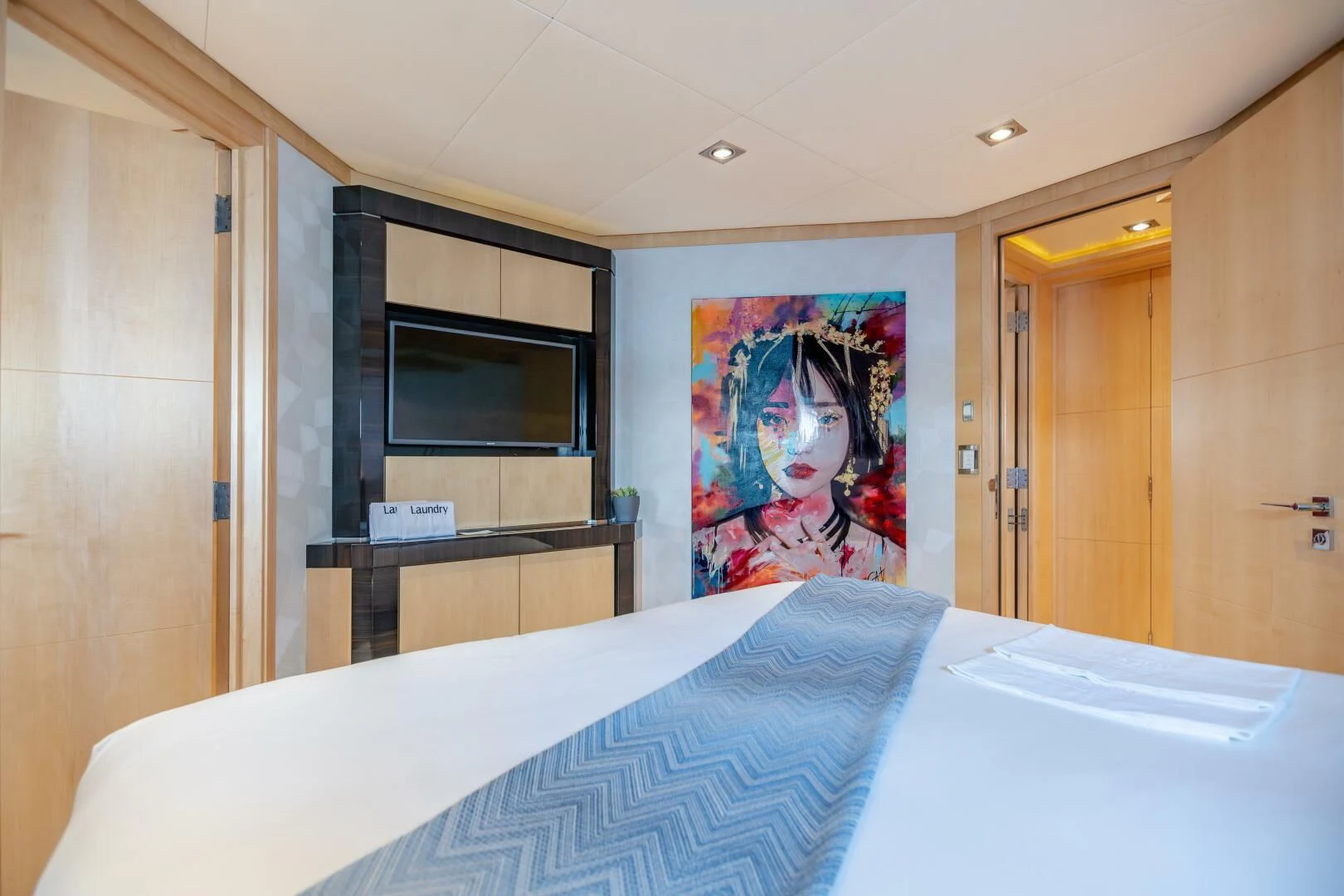 a bed in a room aboard KJOS Yacht for Charter