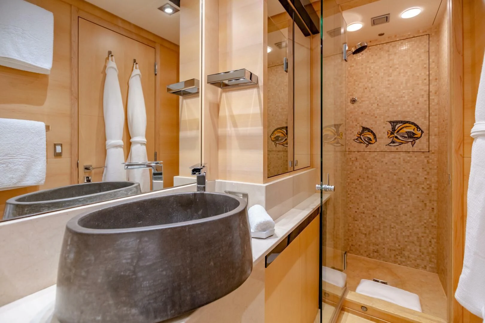 a bathroom with a large tub aboard KJOS Yacht for Charter