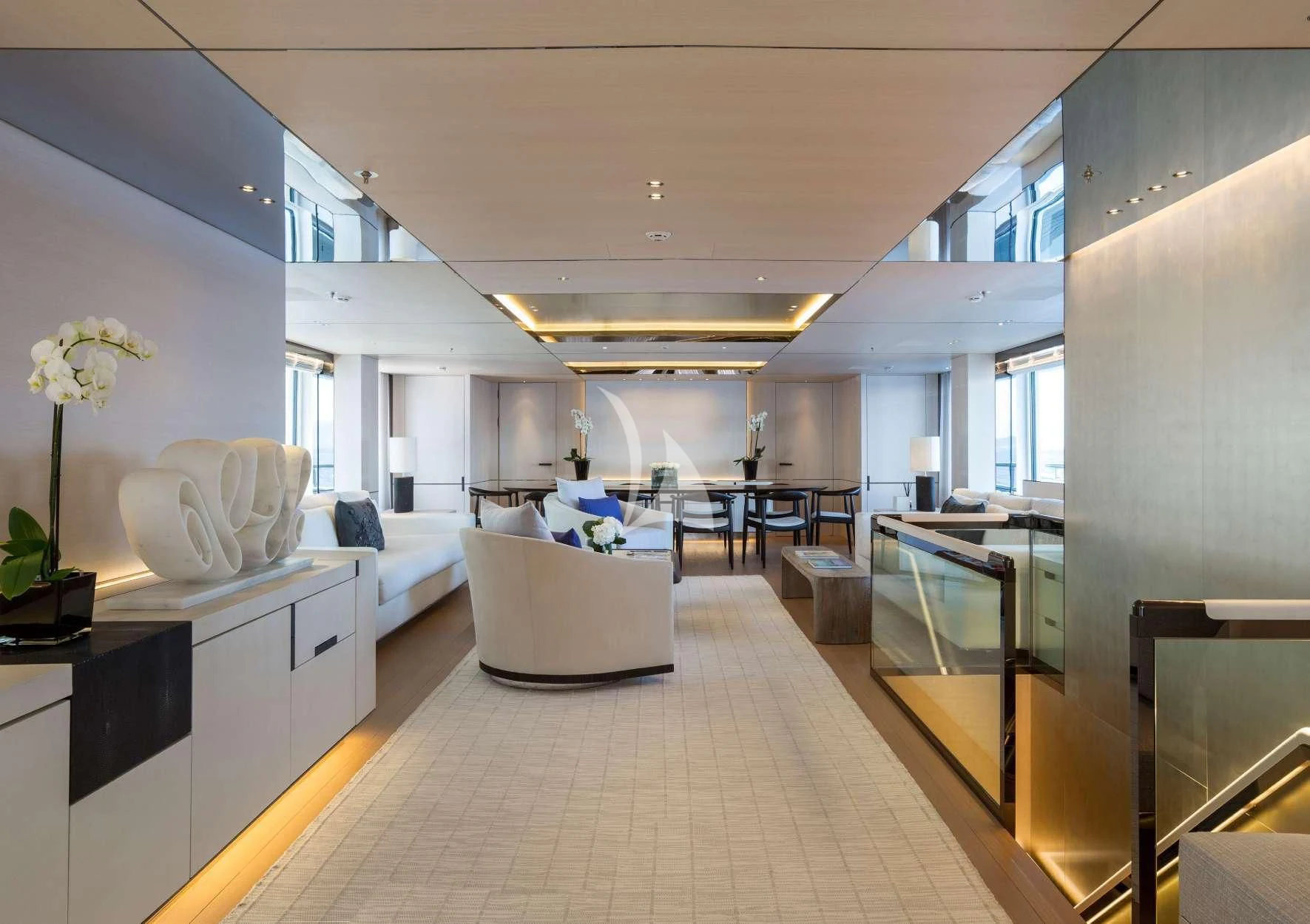 a large modern living room aboard KAMALAYA Yacht for Sale