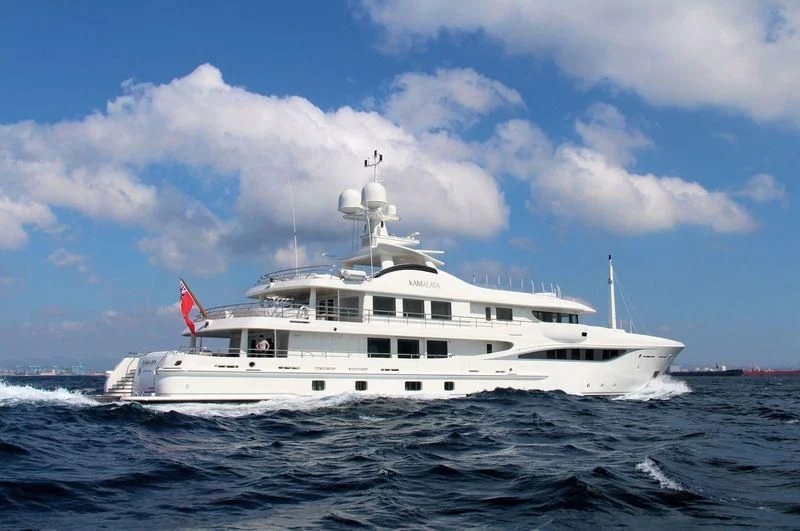 a white boat in the water aboard KAMALAYA Yacht for Sale