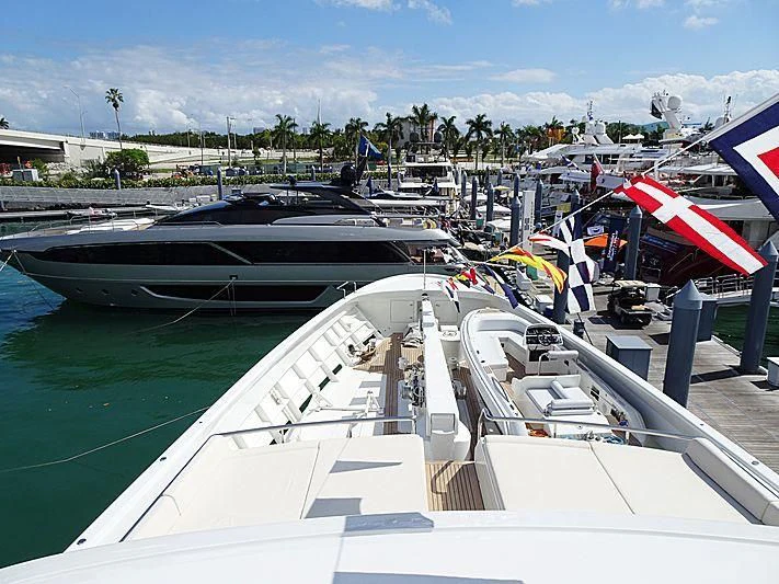 several boats docked at a pier aboard KAMALAYA Yacht for Sale