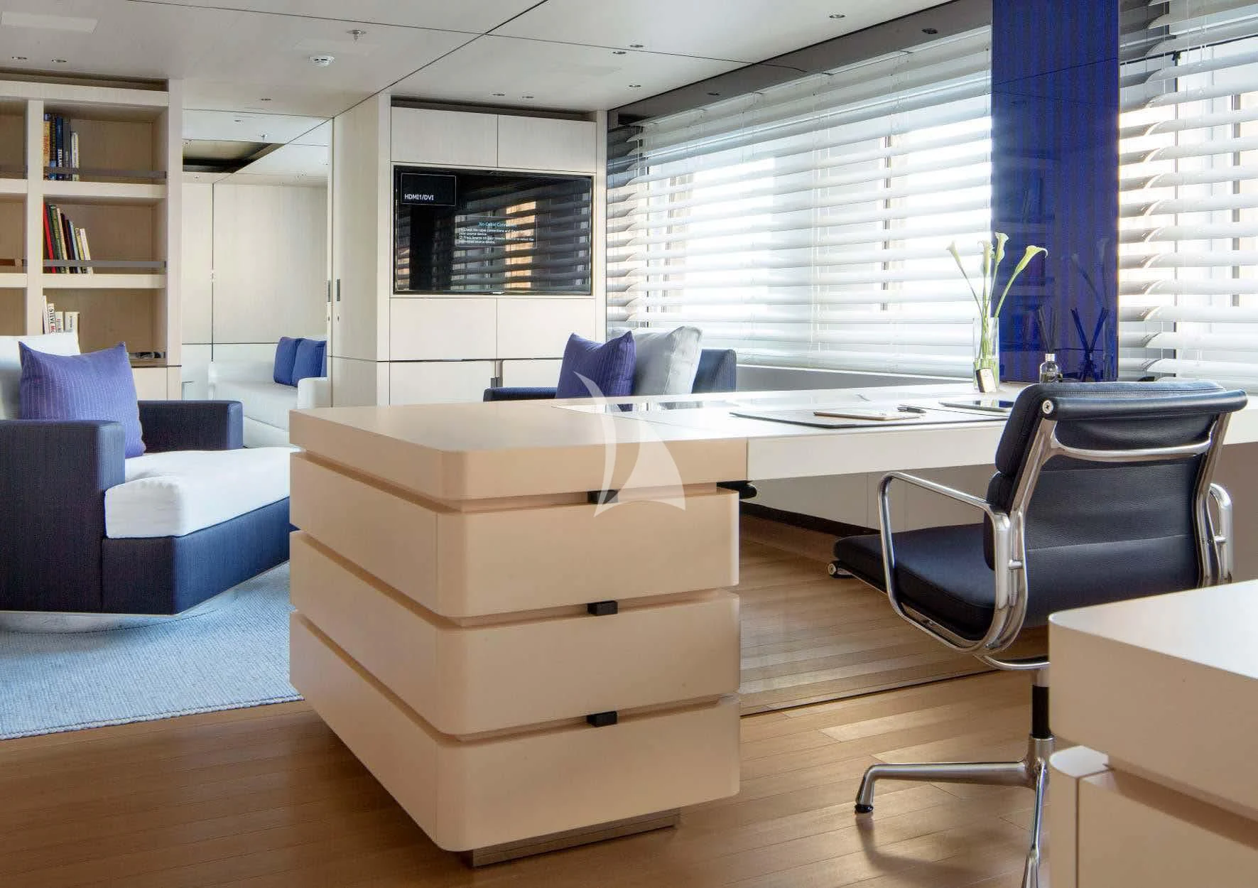 a room with a desk and a chair aboard KAMALAYA Yacht for Sale