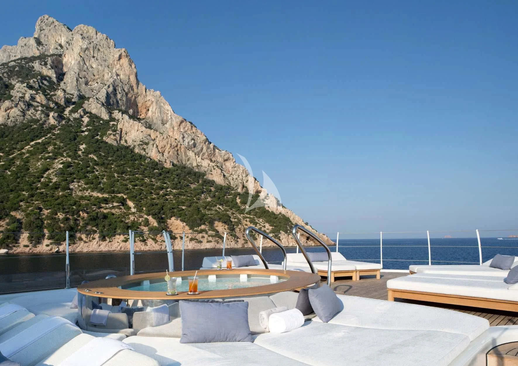 a boat on a beach aboard KAMALAYA Yacht for Sale