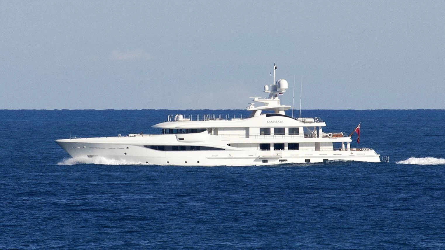 a white boat in the water aboard KAMALAYA Yacht for Sale