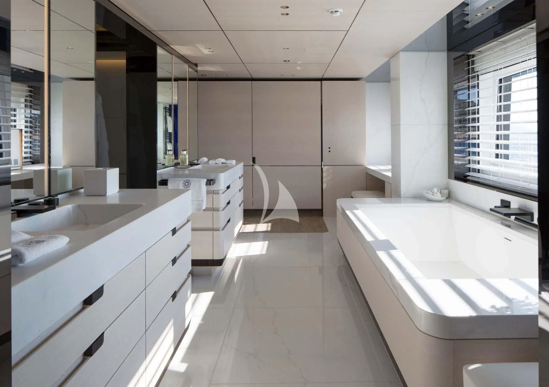 a bathroom with a tub sink and sinks aboard KAMALAYA Yacht for Sale