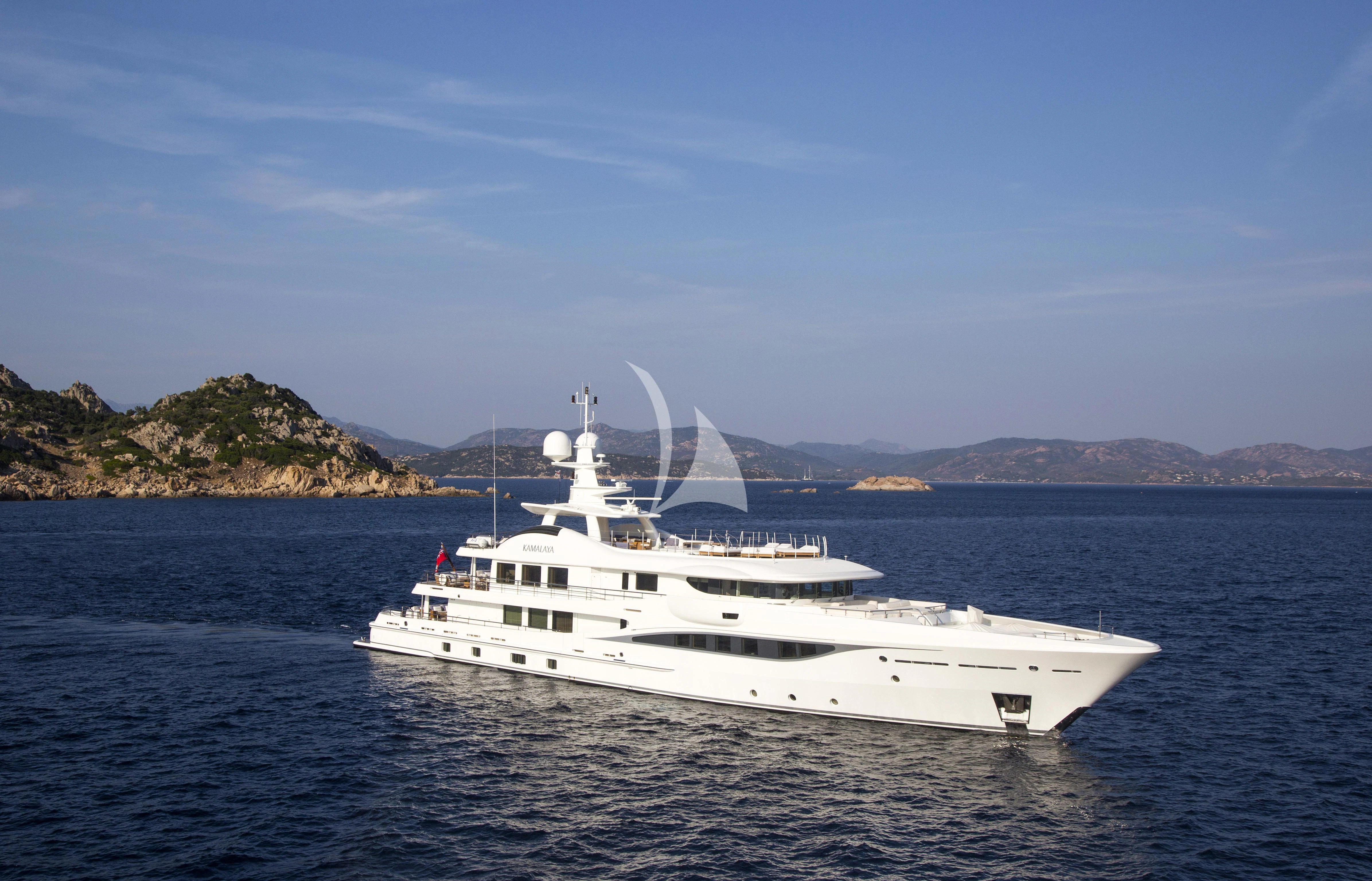 a white yacht in the water aboard KAMALAYA Yacht for Sale