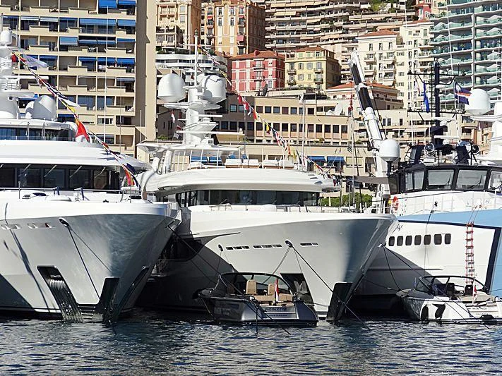 a group of boats in a harbor aboard KAMALAYA Yacht for Sale