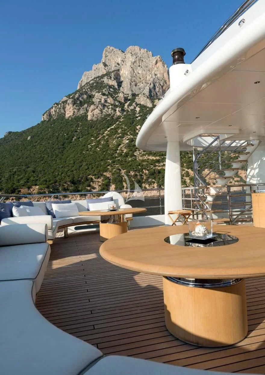 a table with a large white object on it aboard KAMALAYA Yacht for Sale