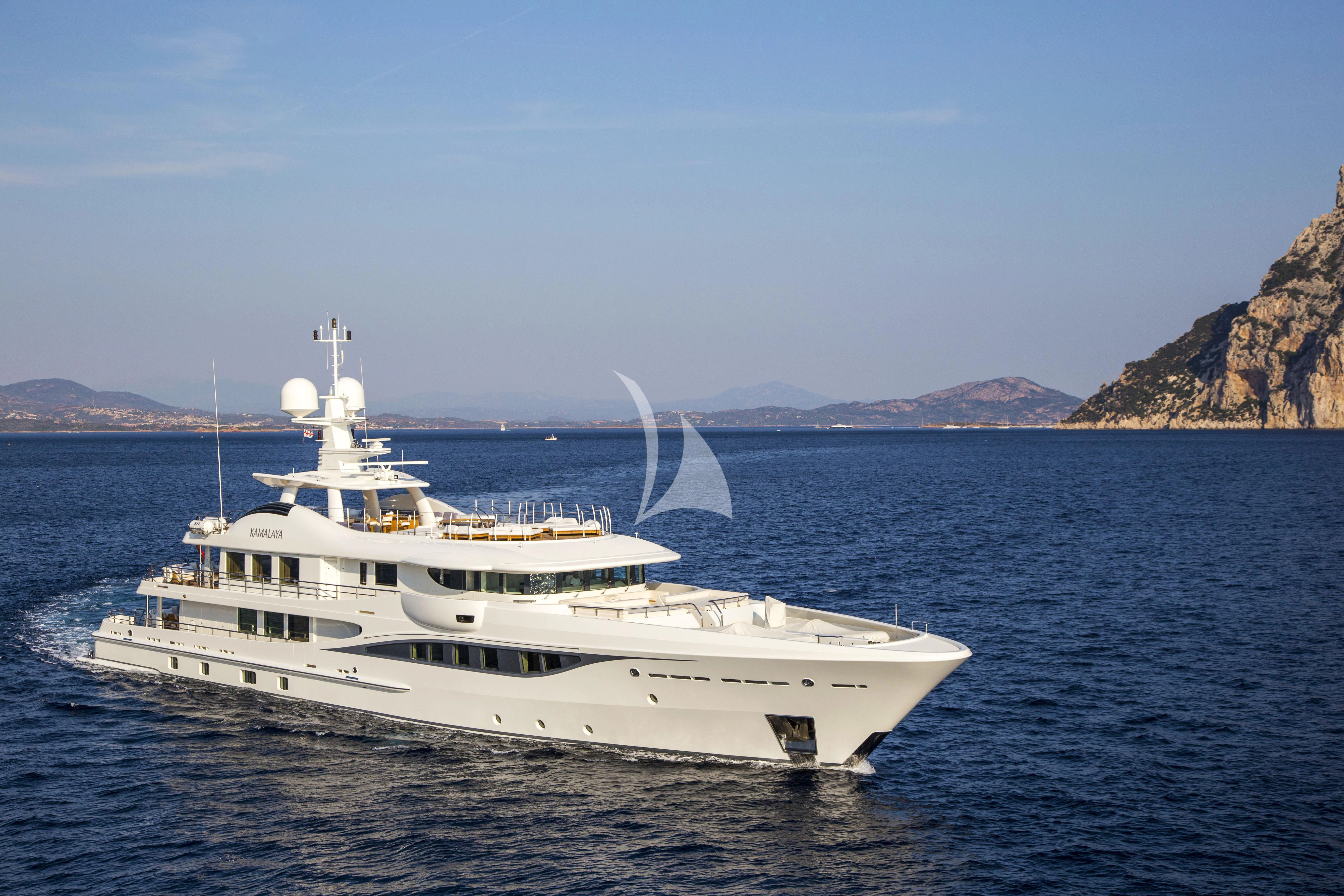 a white yacht in the water aboard KAMALAYA Yacht for Sale