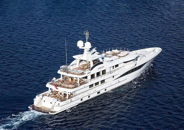 a large ship in the water aboard KAMALAYA Yacht for Sale