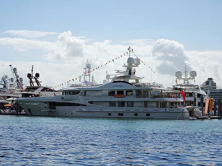 a large ship in the water aboard KAMALAYA Yacht for Sale