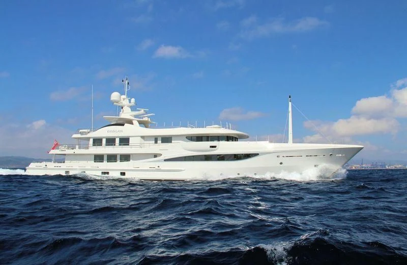 a white yacht in the water aboard KAMALAYA Yacht for Sale