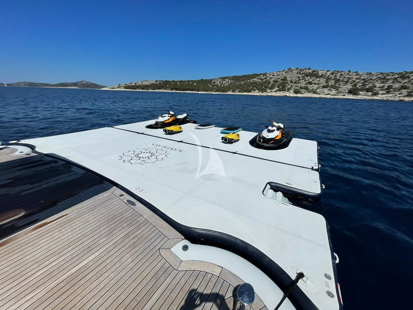 a boat with a motor aboard KAMALAYA Yacht for Sale