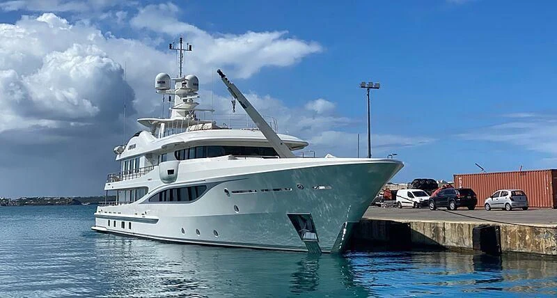 a large white boat aboard KAMALAYA Yacht for Sale