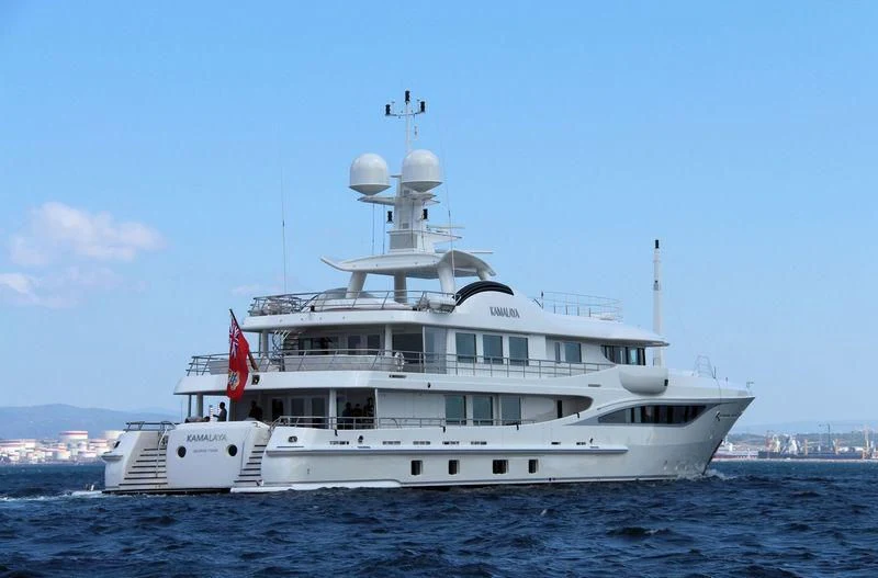 a large white ship in the water aboard KAMALAYA Yacht for Sale