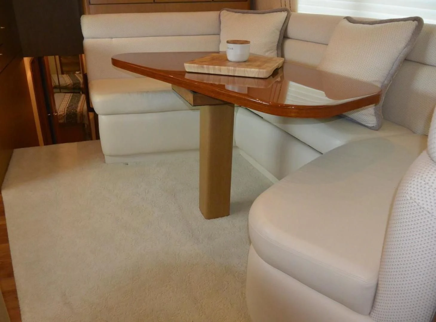 a coffee table with a coffee table aboard DOG HOUSE Yacht for Sale