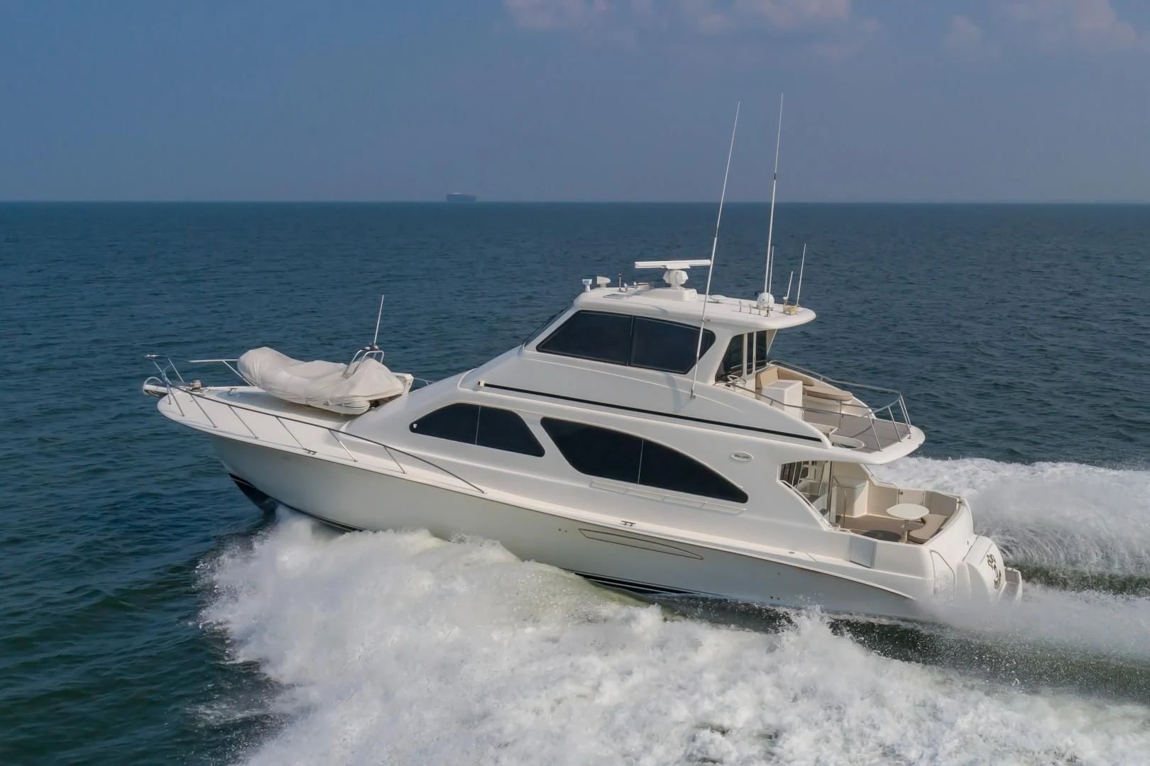 a boat on the water aboard DOG HOUSE Yacht for Sale