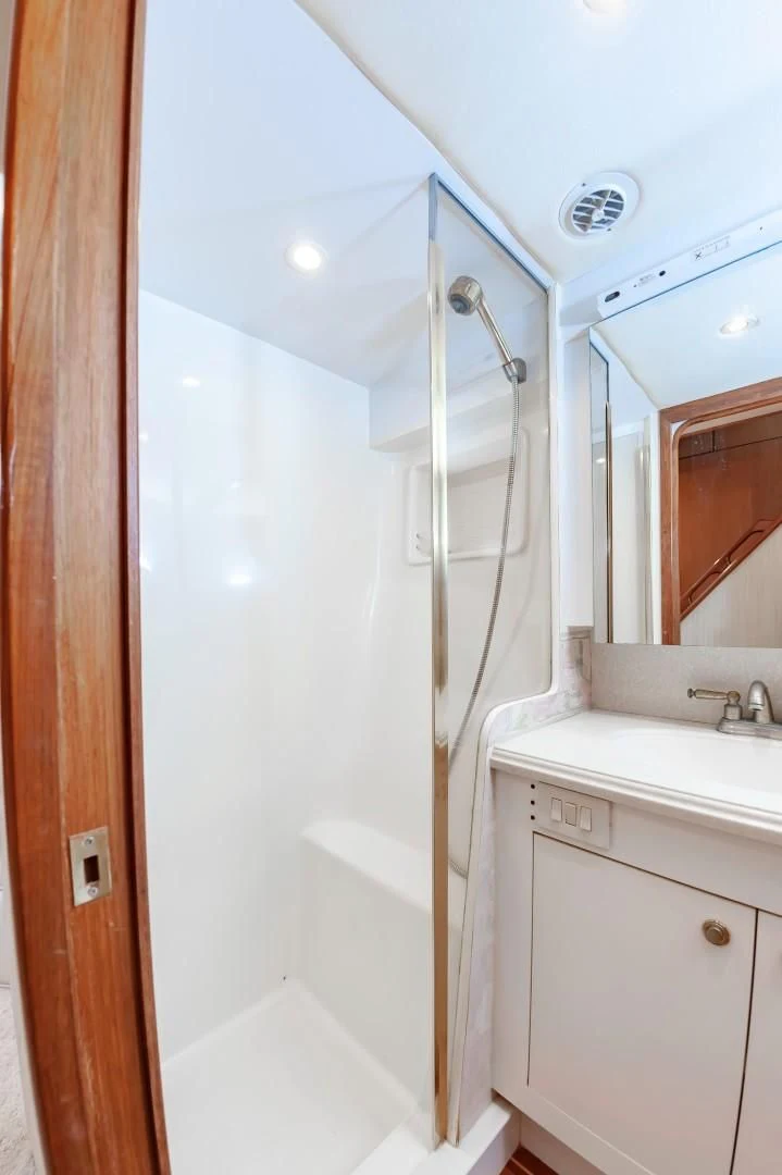 a shower unit in a bathroom aboard DOG HOUSE Yacht for Sale
