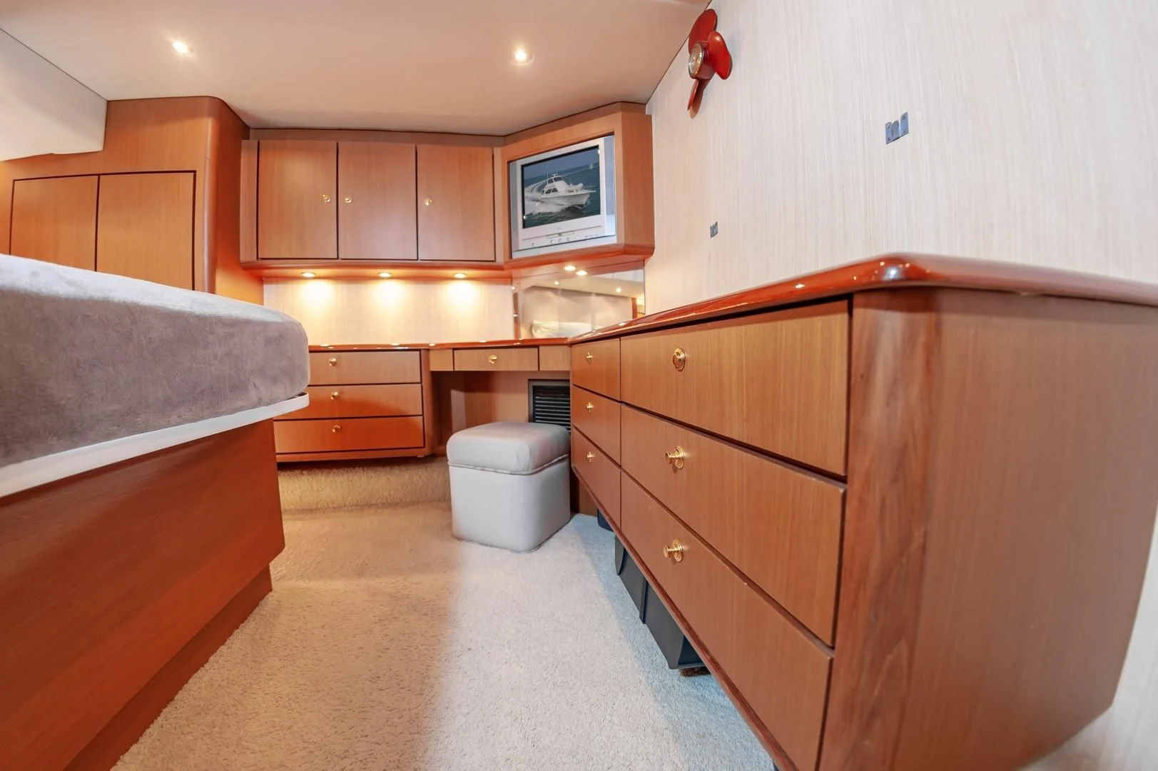 a kitchen with wooden cabinets aboard DOG HOUSE Yacht for Sale