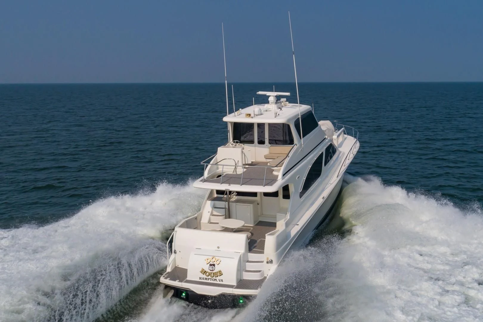 a boat on the water aboard DOG HOUSE Yacht for Sale
