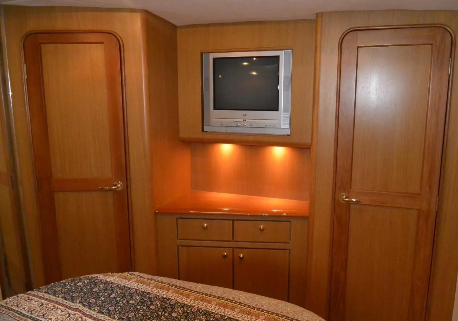 a tv on a wall aboard DOG HOUSE Yacht for Sale