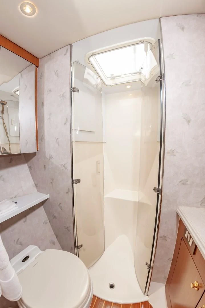 a shower unit in a bathroom aboard DOG HOUSE Yacht for Sale