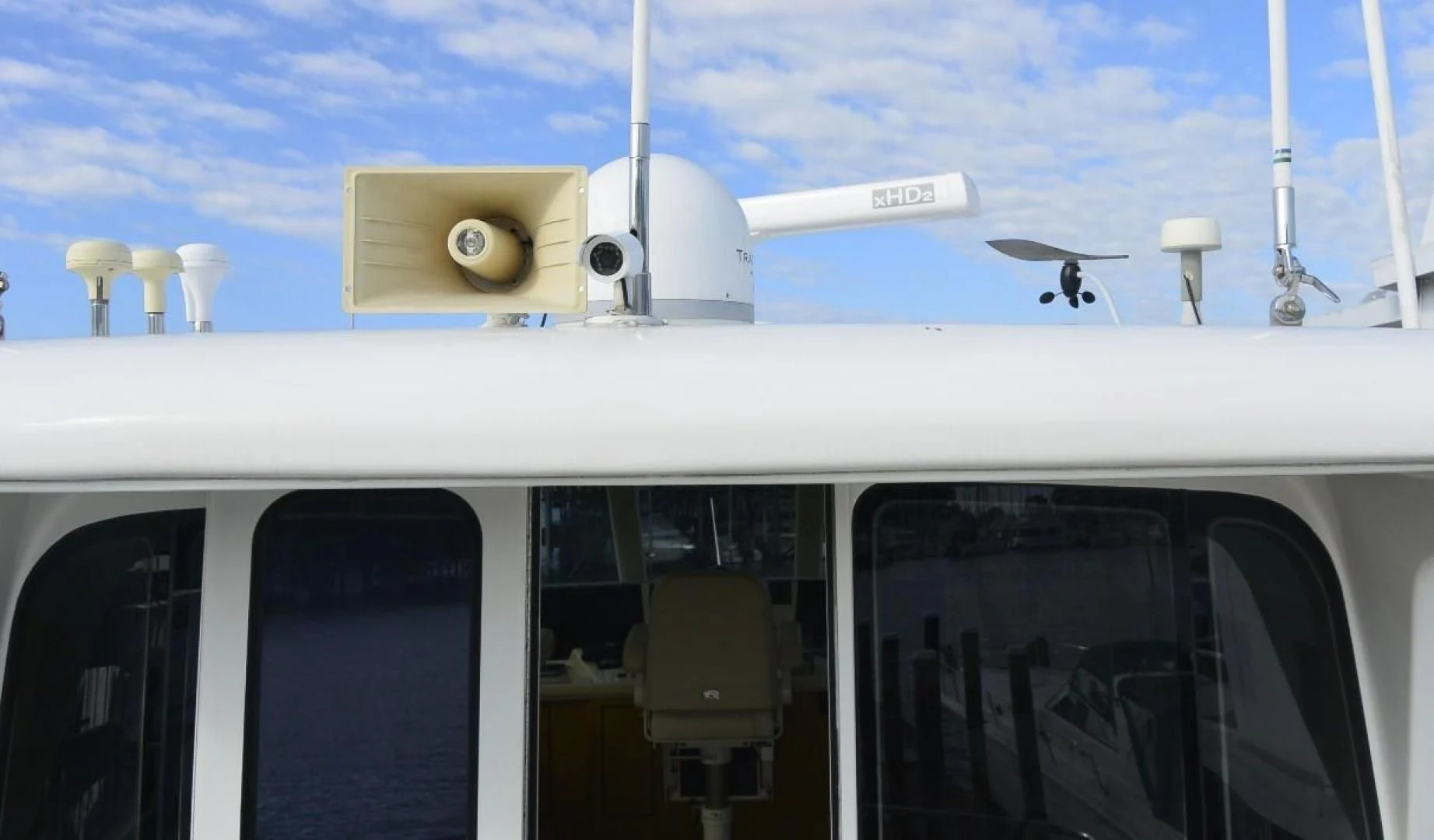 a white airplane with a propeller aboard DOG HOUSE Yacht for Sale