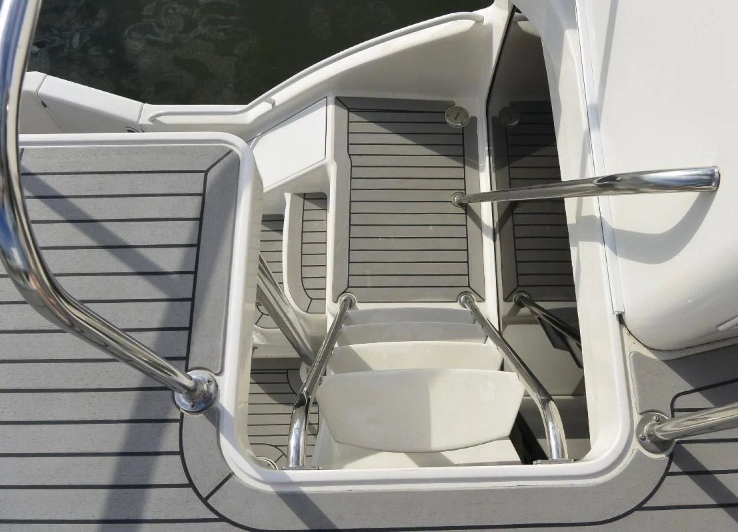 a white boat with a metal frame aboard DOG HOUSE Yacht for Sale