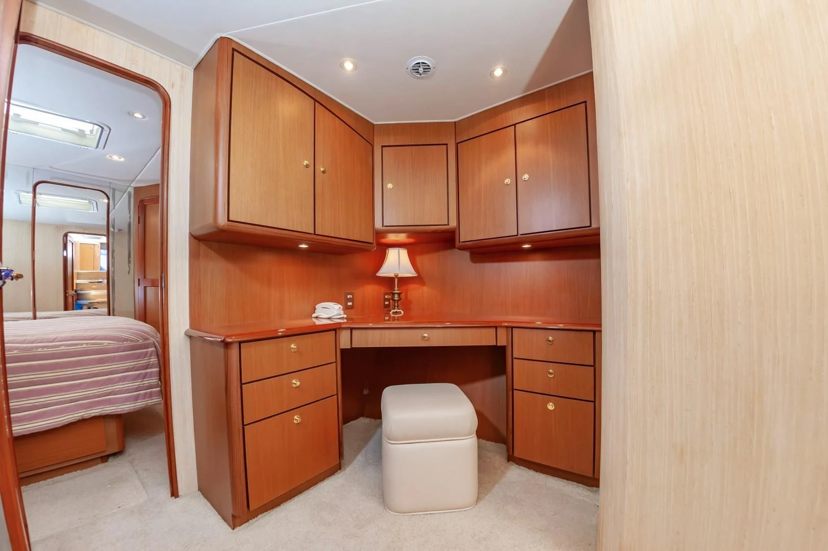 a bathroom with a toilet and a sink aboard DOG HOUSE Yacht for Sale