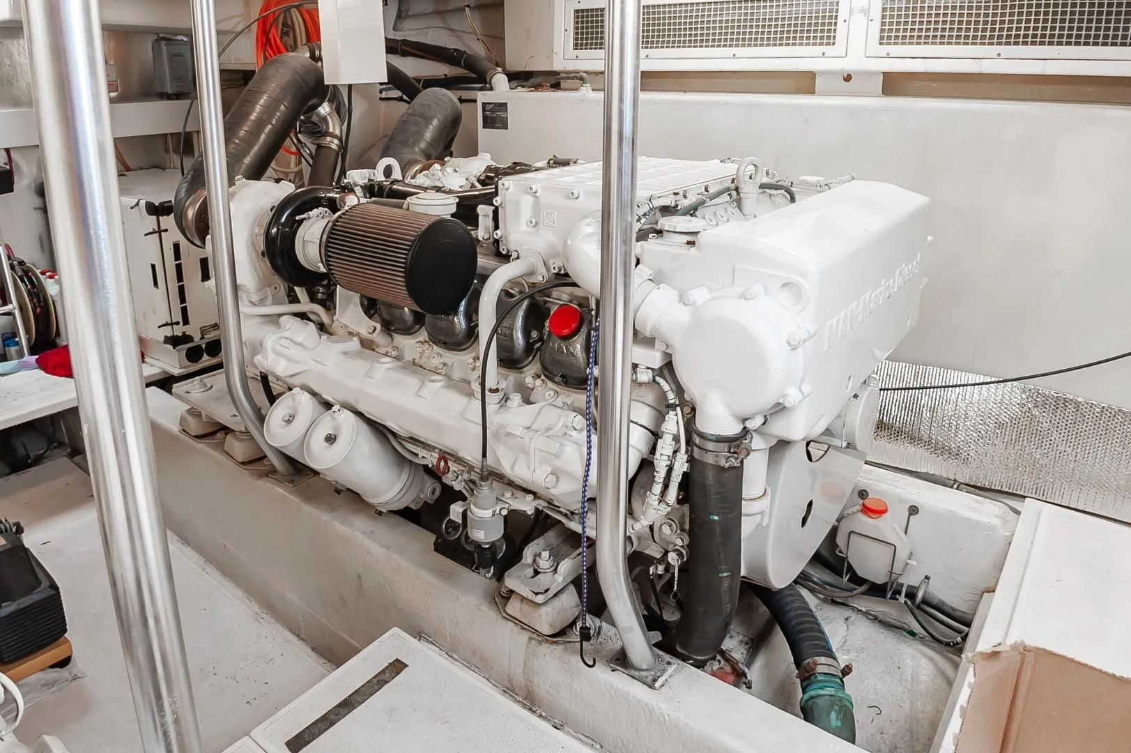 a machine with a large metal cylinder aboard DOG HOUSE Yacht for Sale