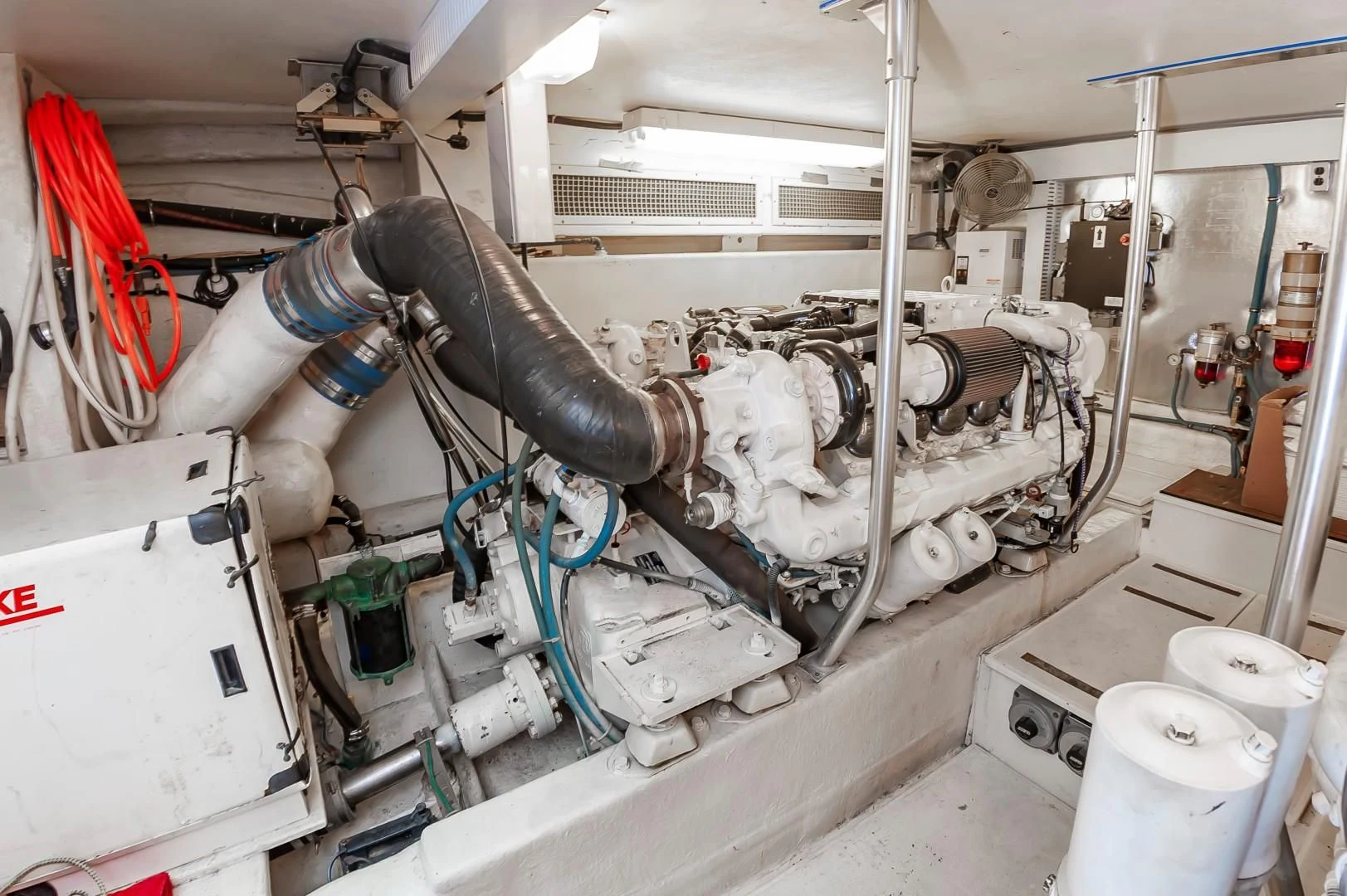 a machine in a room aboard DOG HOUSE Yacht for Sale