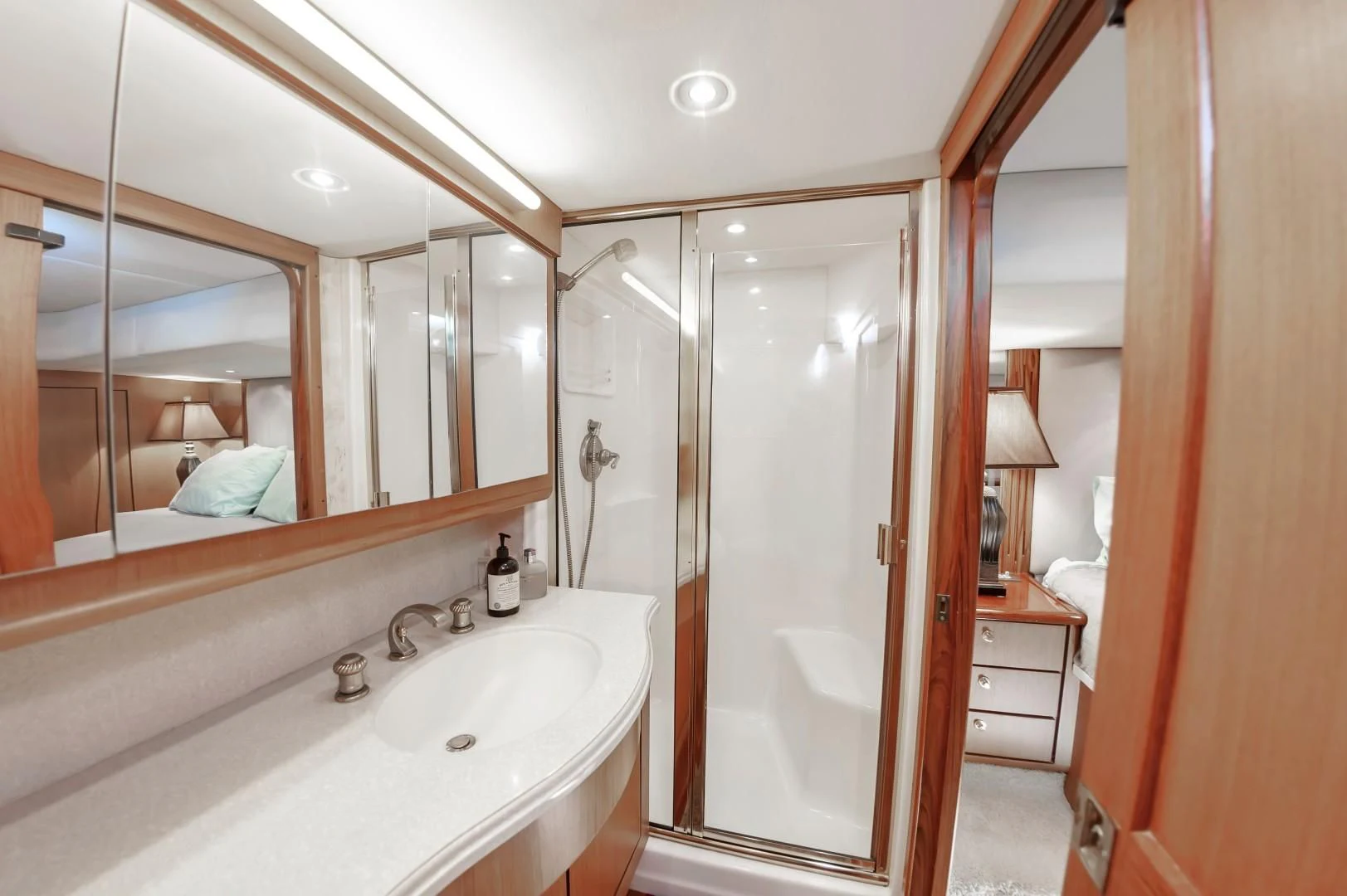 a bathroom with a large mirror aboard DOG HOUSE Yacht for Sale