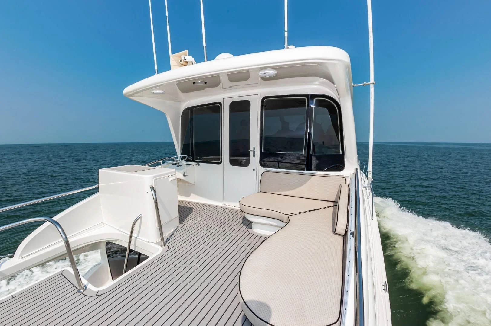 a boat on the water aboard DOG HOUSE Yacht for Sale